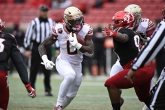 Oct 24, 2020; Louisville, Kentucky, USA;  Florida State Seminoles running back Jashaun Corbin (0) runs the ball against Louisville Cardinals linebacker C.J. Avery (9) during the first half of play at Cardinal Stadium. Jamie Rhodes-ACC Pool