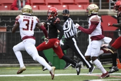 Oct 24, 2020; Louisville, Kentucky, USA;  Louisville Cardinals wide receiver Tutu Atwell (1) runs the ball against Florida State Seminoles defensive back Raymond Woodie III (31) during the first half of play at Cardinal Stadium. Jamie Rhodes-ACC Pool