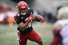 Oct 24, 2020; Louisville, Kentucky, USA;  Louisville Cardinals running back Javian Hawkins (10) runs the ball against the Florida State Seminoles during the first half of play at Cardinal Stadium. Jamie Rhodes-ACC Pool