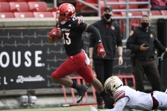 Oct 24, 2020; Louisville, Kentucky, USA; Louisville Cardinals tight end Marshon Ford (83) evades a tackle during the first half of play at Cardinal Stadium. Jamie Rhodes-ACC Pool