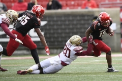 Oct 24, 2020; Louisville, Kentucky, USA;  Florida State Seminoles linebacker Kalen DeLoach (20) tackles Louisville Cardinals running back Jalen Mitchell (15) during the second half of play at Cardinal Stadium. Jamie Rhodes-ACC Pool
