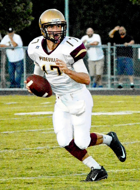 Tucker Woolum completed 23 of his passes for 336 yards and three touchdowns during Friday’s game.  - Anthony Cloud | Daily News 