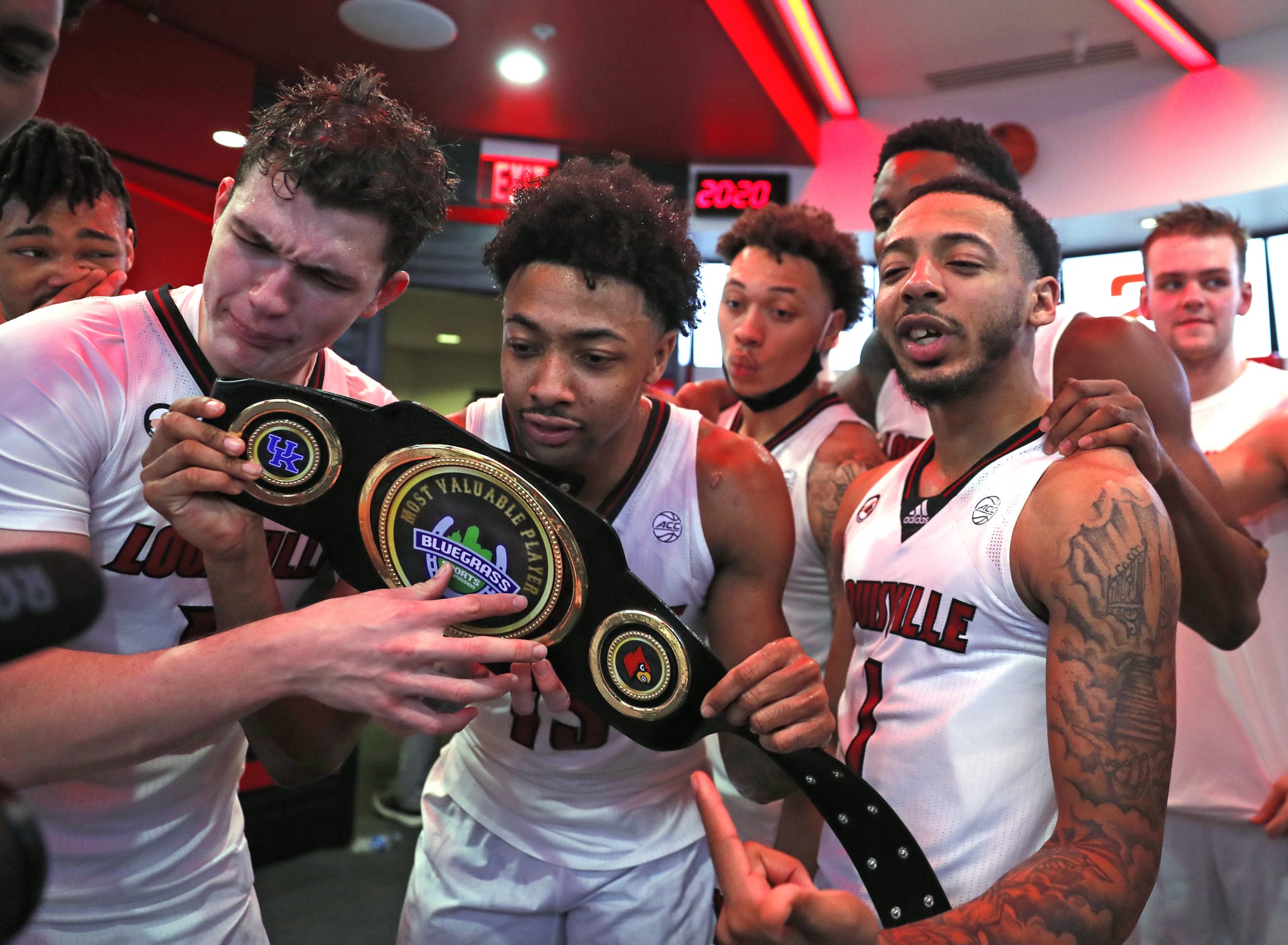 Louisville fan celebrates Louisville with the biggest head tattoo